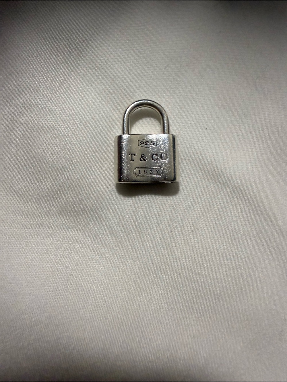 Tiffany & Co. Silver Padlock Charm. Opens and closes